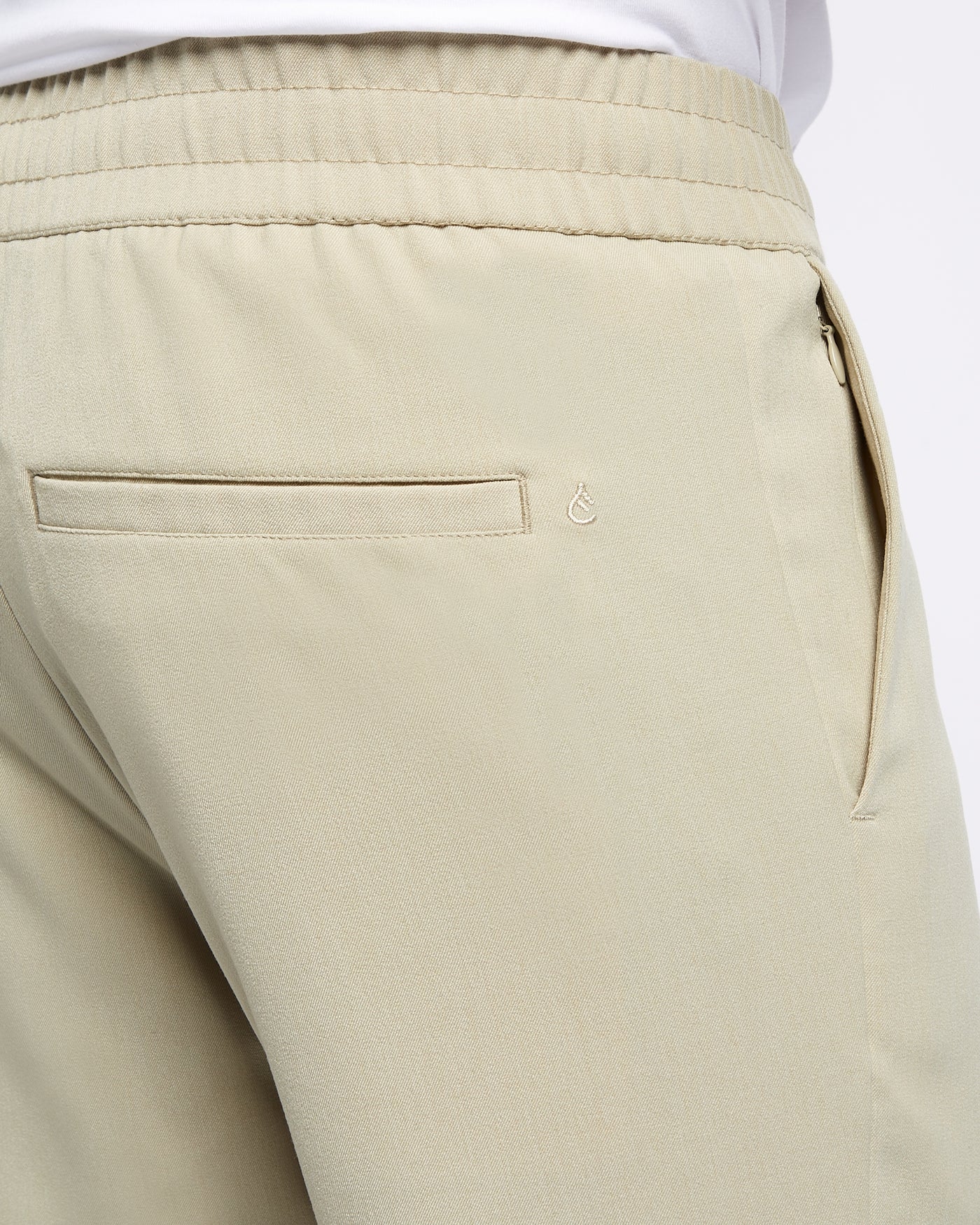 Relaxed Performance trousers Sand