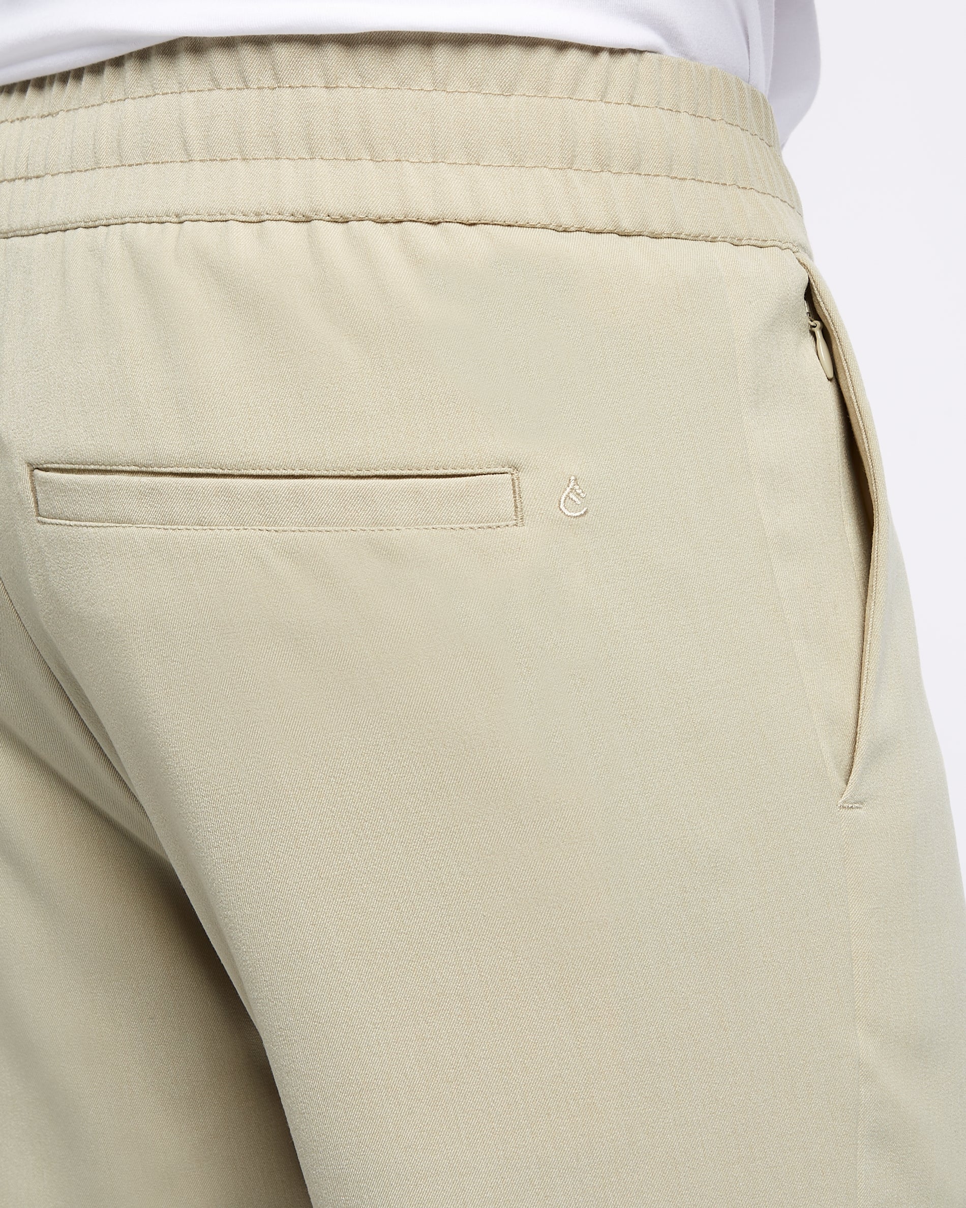 Relaxed Performance trousers Sand